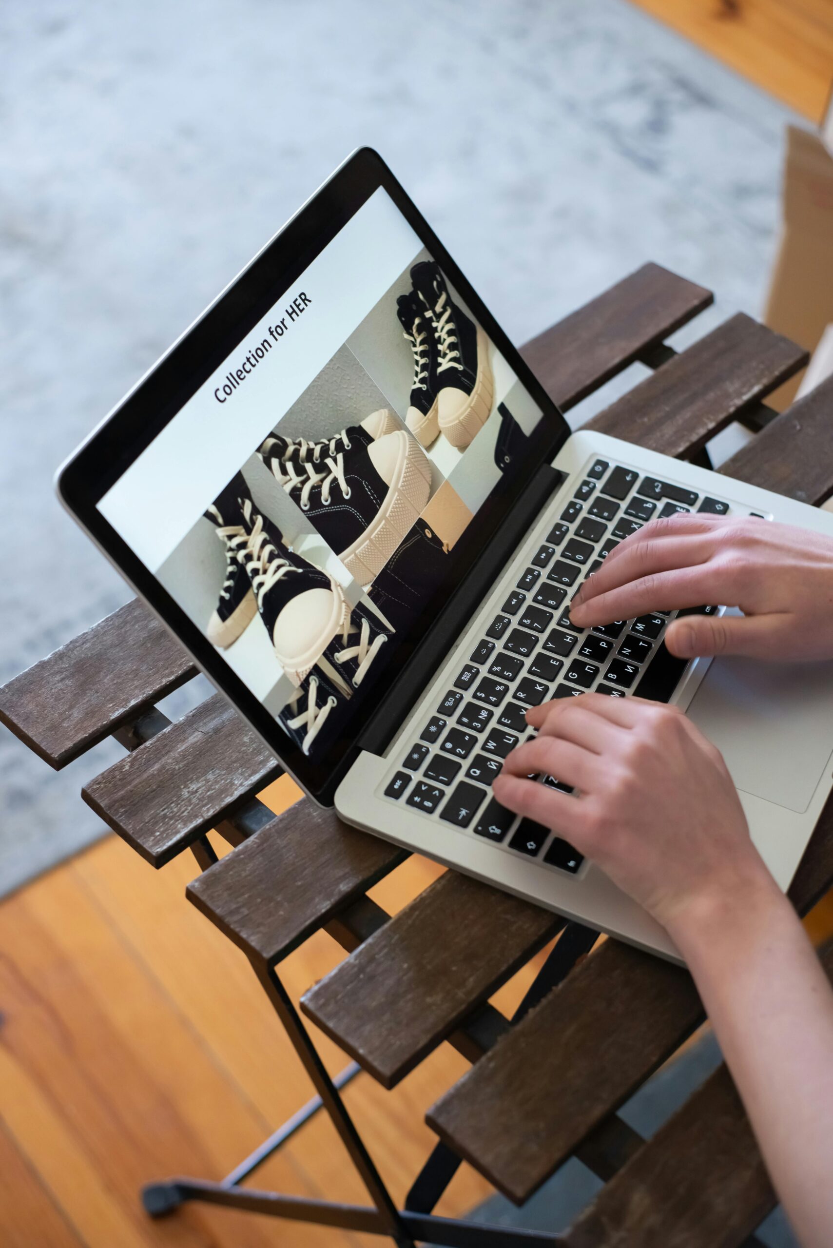 laptop showing images of sports shoes